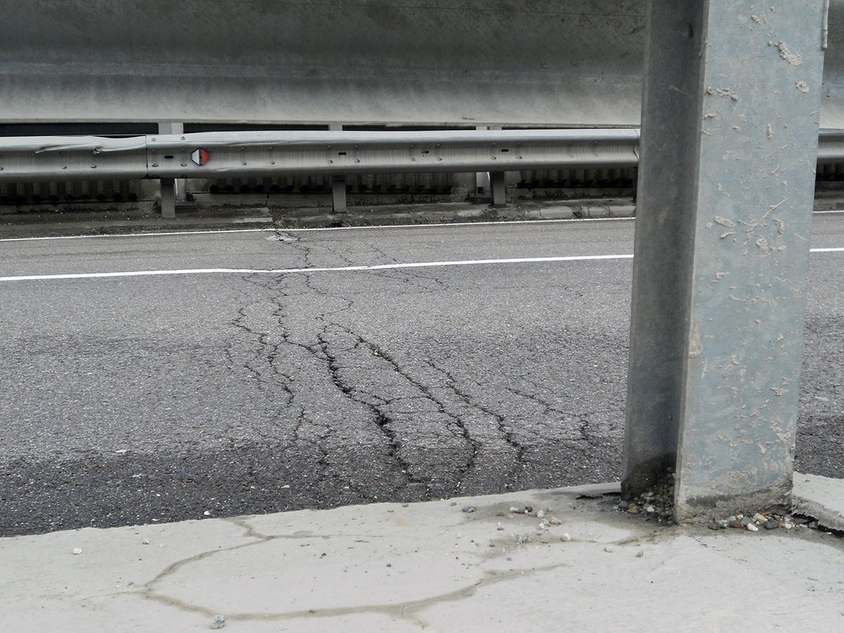 asphalt bumpy subsidence ground foundation