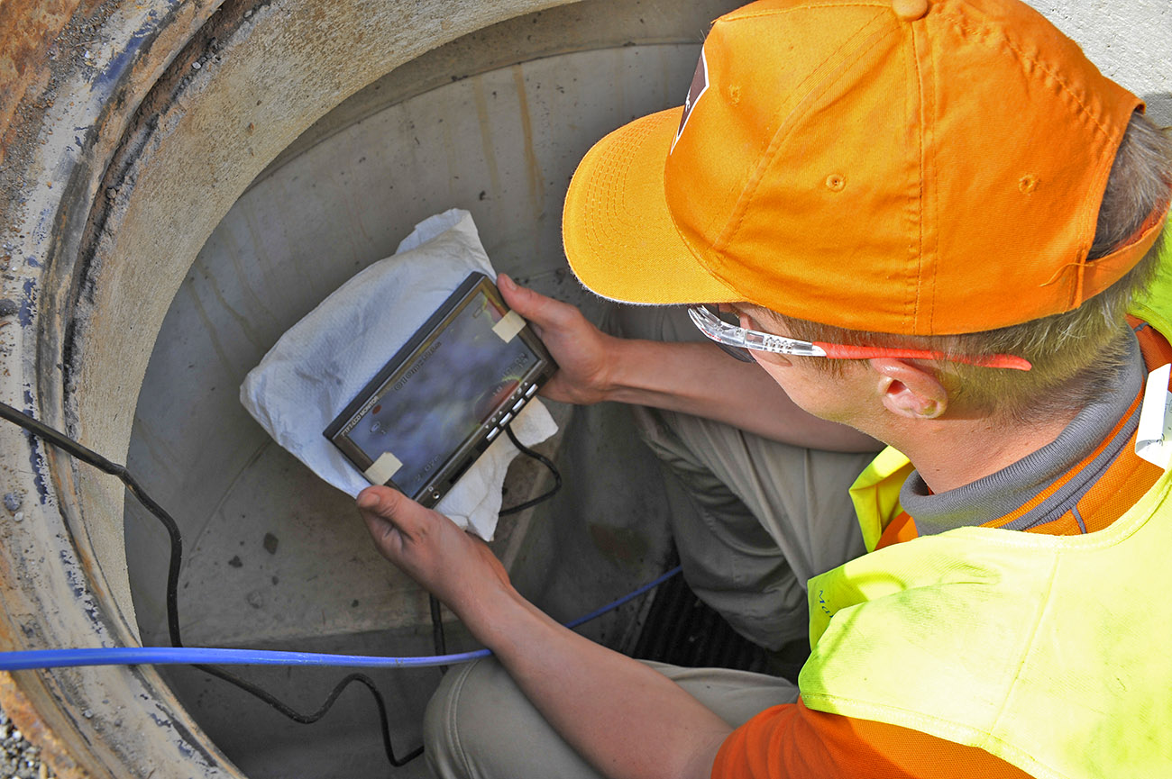 inspection pipes under road surface