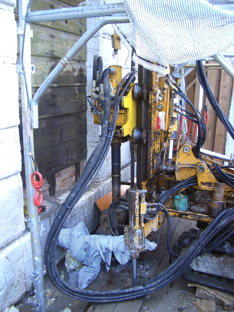 intervention core drilling for soil consolidation foundation expanding resins